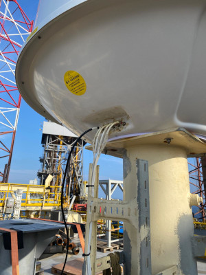 Satellite TVRO antenna aboard drilling jackup rig